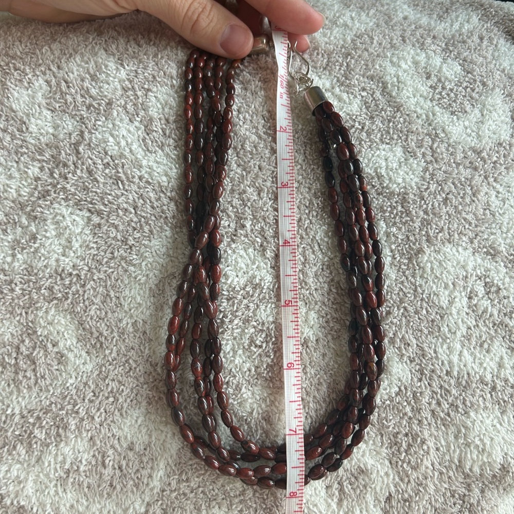 Woman’s real gemstone necklace